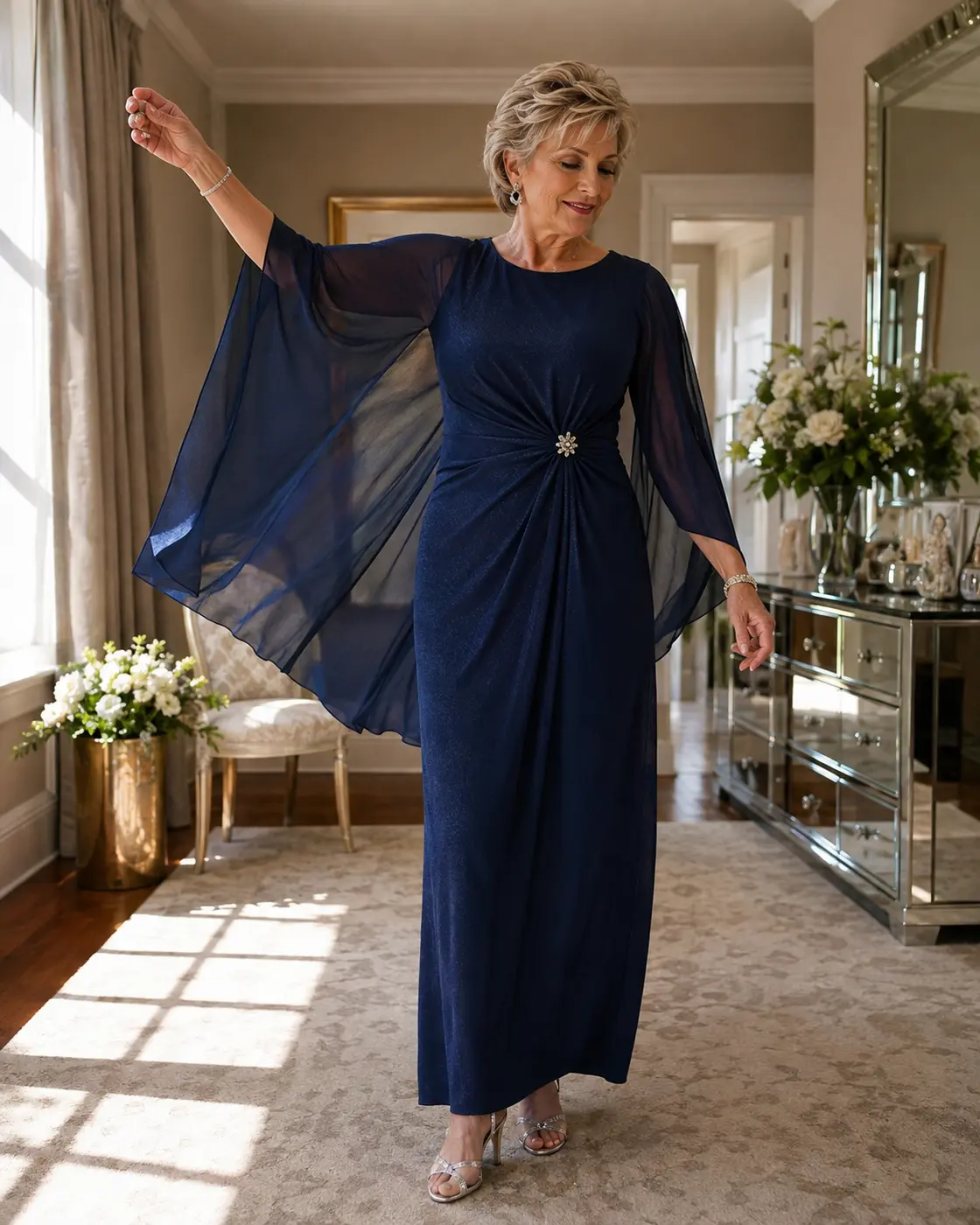 intentional-cape-sleeve-dress Navy mother-of-the-bride dress with elegant flowing cape sleeves