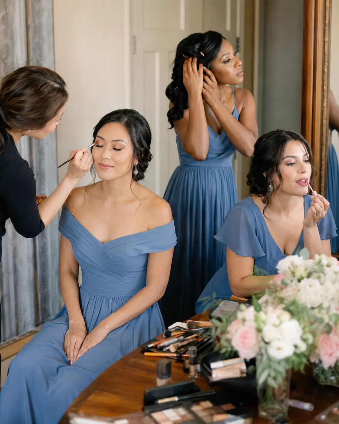 optional-bridesmaid-hair-makeup Bridesmaids choosing professional or self-styled wedding makeup